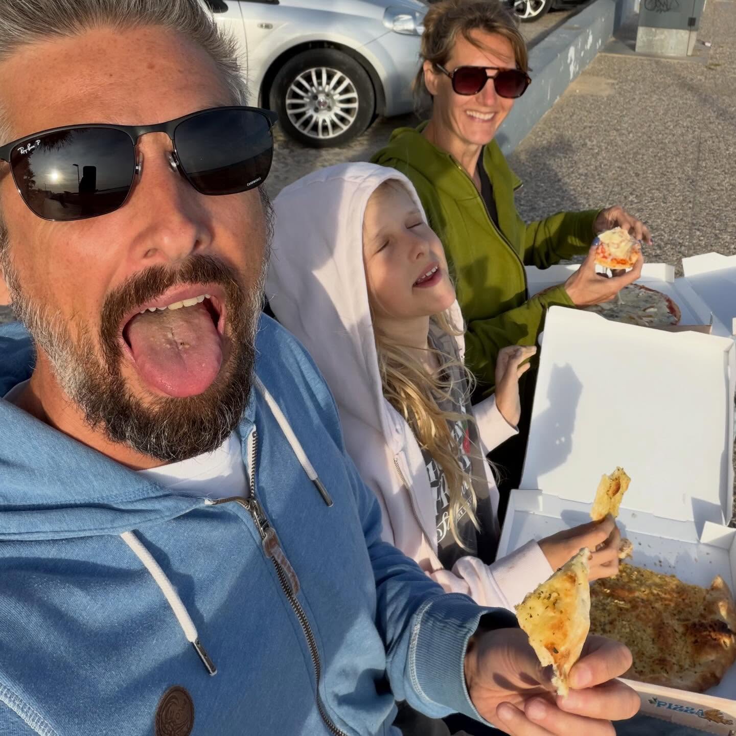 Family beach pizza night